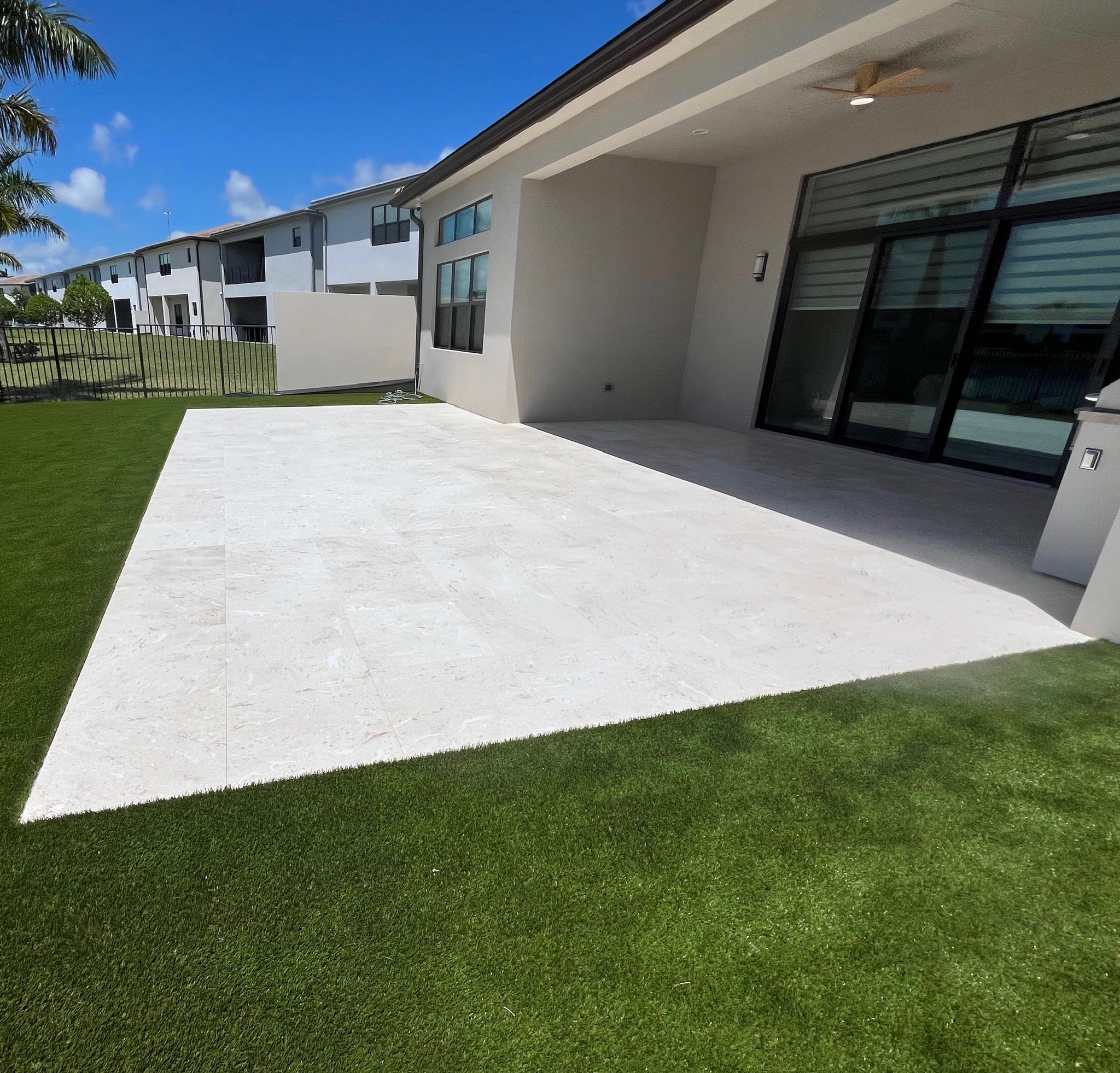 Herringbone travertine pool deck South Florida paver contractor