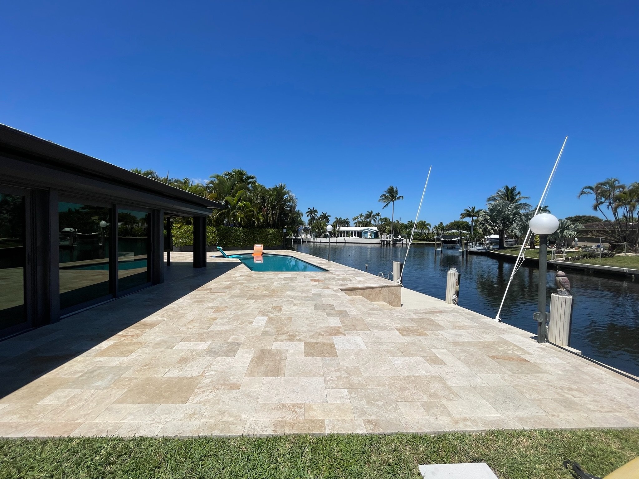 Large format modern paver driveway installation South Florida